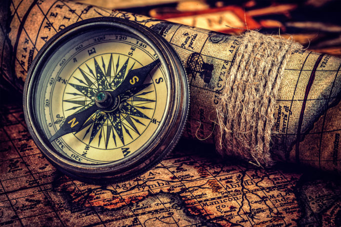 Travel geography navigation concept background - vintage retro effect filtered hipster style image of old vintage retro compass on ancient world map - Bruno Cinti discusses the insurmountable difficulties for the transgender traveler as he embarks on a Latin American escapade with no return ticket.